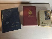 Front covers of all three books displayed side by side