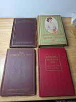 Front covers of all four hardcover books