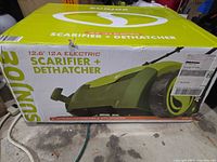 Front of sealed Sun Joe AJ801E scarifier/dethatcher box