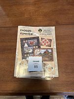 Front view of stack showing Indian Summer booklet