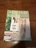 Front cover Jelly Roll Quilts showing title and author