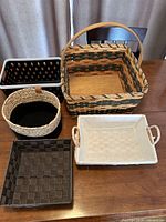 Five baskets laid out on table