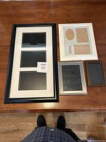 All four frames laid out on table for size comparison