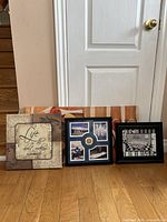 Group view of all framed prints and canvases