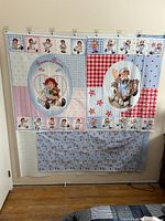 Both fabric panels displayed side by side hanging