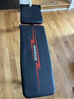 Top view showing full length of bench and branding