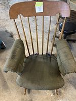 Top view of rocking chair showing fabric seat and arm pads