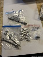 All bagged items including ratchet, extension, stubby wrenches, open-end wrenches, adapter