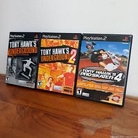 Front view of all three PlayStation 2 Tony Hawk game cases