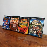 Front view of all four PlayStation 2 game cases