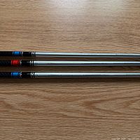 Three silver Mitsubishi Tensei shafts side-by-side showing overall appearance