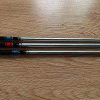 Three silver Tensei shafts side-by-side