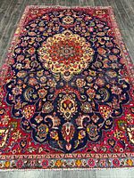 Full view of rug showing entire design and fringe