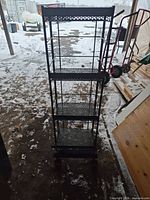 Front view showing full height and five shelves