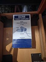 Front of Uline earplugs box showing model, NRR and quantity