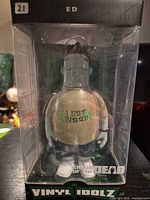 Front view of boxed Ed vinyl figure