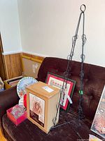 Lot overview showing card tree, boxed nativity, tray, needlepoint and other items