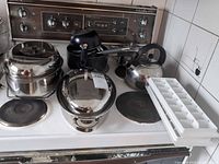 overview of all cookware items on stove