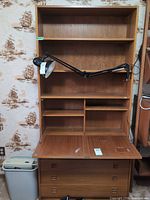 Entire unit with drop-front open showing interior cubbies