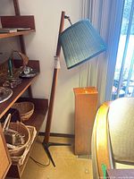 Full view teak floor lamp with shade and base