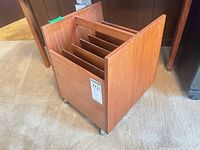 overall view of teak cart showing casters and exterior finish