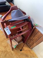 Valet stand with cane, hat and belt