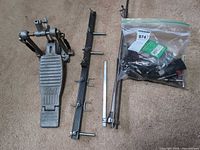 Overall lot showing pedal, rails, stand rods, bag of cables