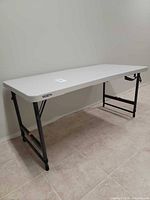 Table fully extended showing top and legs