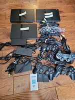 Group shot of all consoles, controllers, cables, power bricks, memory cards and HDMI adaptors