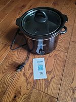 Full view of Rival slow cooker with lid and power cord