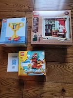 Front view of all three sealed LEGO sets 40766, 40688, 40612
