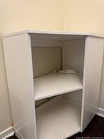 Front view showing open shelves and open back