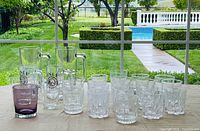 Group view showing UNLV steins, purple tumbler, and majority of starburst rocks glasses