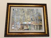 Front view of framed embroidered artwork