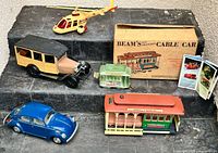 Group shot of all five vehicle decanters with box and pamphlet visible