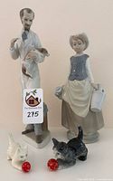 Front view of all four figurines showing size and details