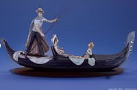 Right-side view of Lladró In the Gondola figurine on base