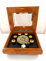Music box open showing bells and disc