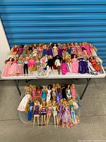 Full view of two tiers displaying all dolls