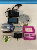 Group shot of all eight electronic items