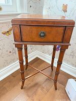 Full view of Ethan Allen wooden accent table showing drawer, legs and stretcher