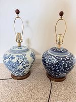 Full view of both blue and white ceramic table lamps