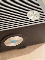 Projector top corner showing 550 R model badge