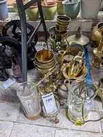 Group shot of assorted brass and glass items