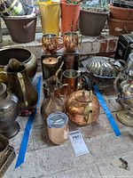 Group shot of all copper items within tape boundary