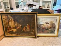 Both framed prints side by side