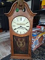 Full view of Glenfiddich wooden pendulum wall clock