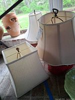 Overview showing all three off-white lamp shades: square bell, round tapered, octagonal bell