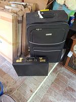 Leisure suitcase and hard briefcase side by side