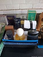 Overview of the nine fragrance containers inside box